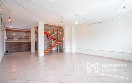 Na predaj rozsiahly investičný pozemok s polyfunkčným domom