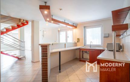 Na predaj rozsiahly investičný pozemok s polyfunkčným domom