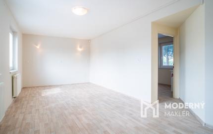 Na predaj rozsiahly investičný pozemok s polyfunkčným domom