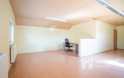 Na predaj rozsiahly investičný pozemok s polyfunkčným domom