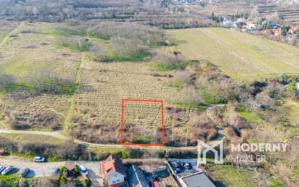 Na predaj perspektívny pozemok v Rači