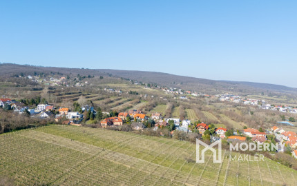 Na predaj perspektívny pozemok v Rači