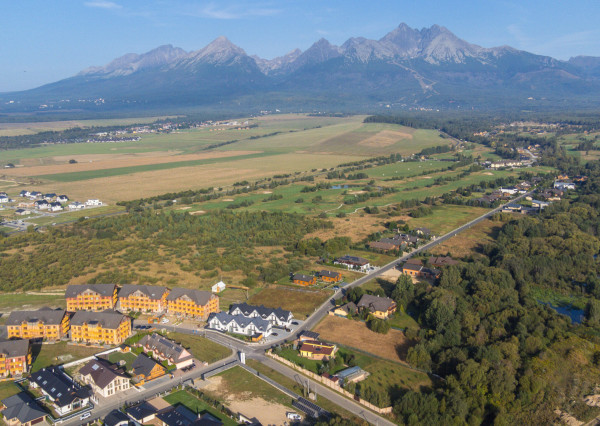 Na predaj perspektívny pozemok so stavebným povolením vo Veľkej Lomnici