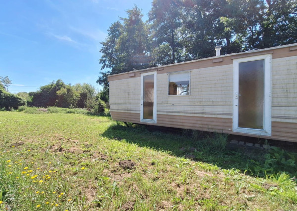 HORNÉ DRŽKOVCE – Mobilný dom s pozemkom pri potoku (790 m²)