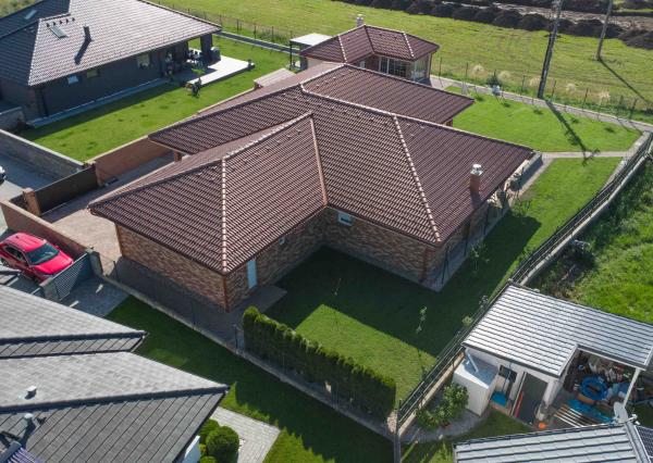 Na predaj exkluzívny rodinný dom s dvoj-garážou v podtatranskej obci Veľký Slavkov